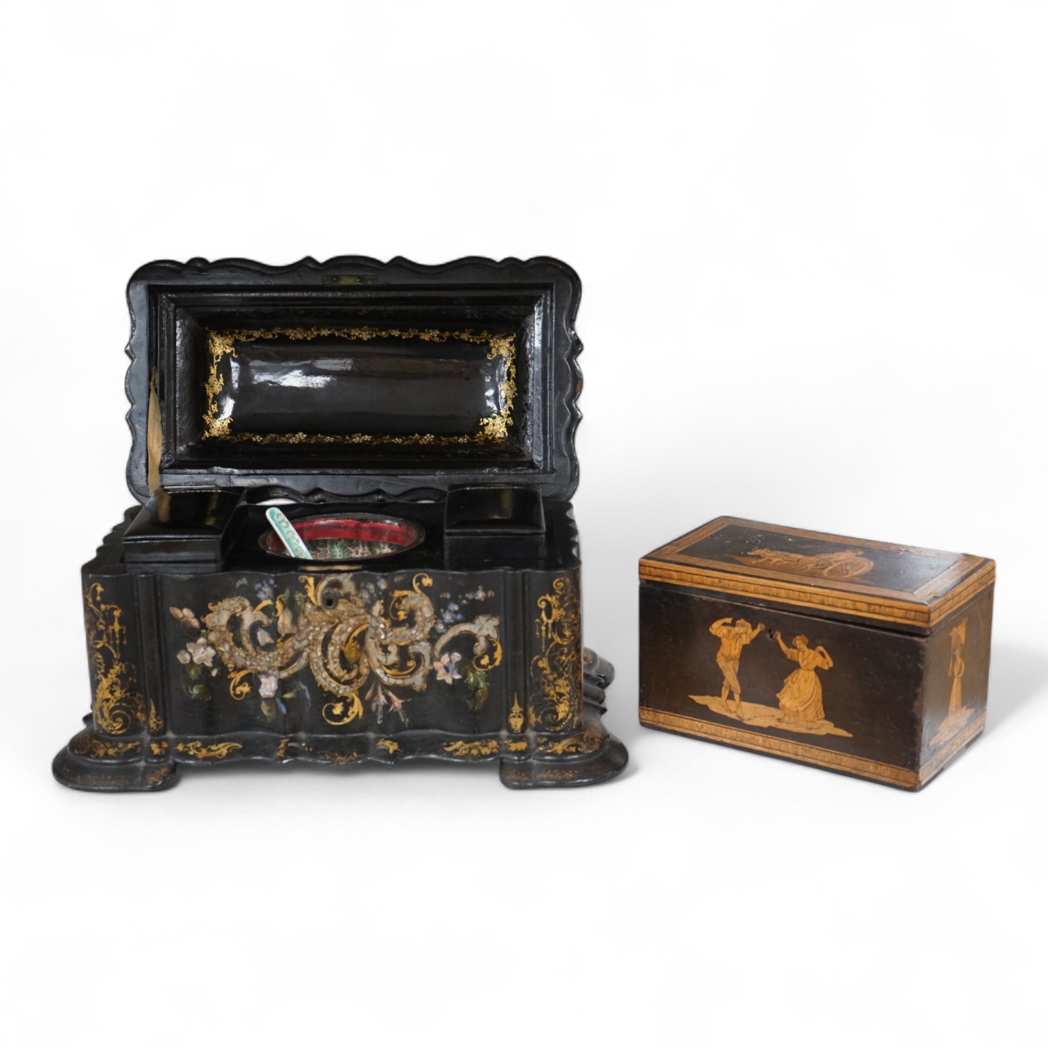 A large Victorian Papier maché and mother-of-pearl tea caddy, 32cm wide, and a Sorrento ware marquetry tea caddy, 19.5cm wide.